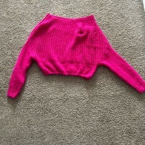 Pink off the shoulder crop sweater.